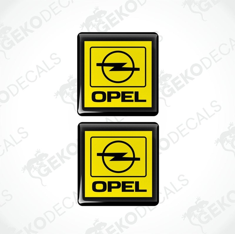 Two yellow and black vinyl stickers with a geometric design representing the Opel brand logo.