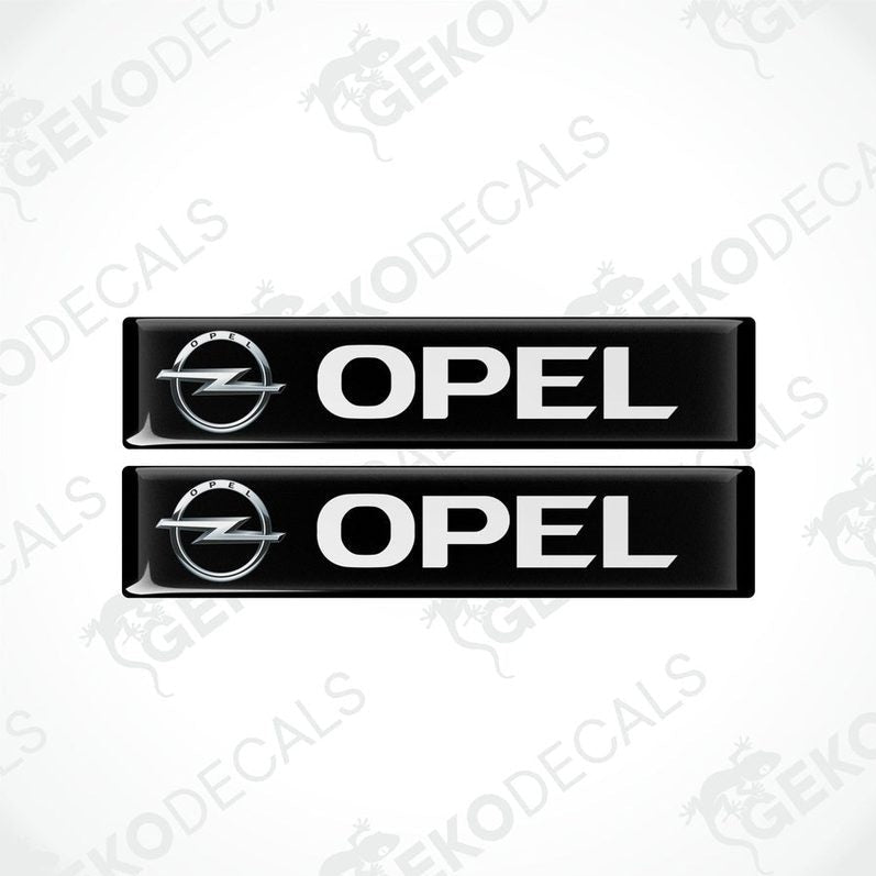 Two black and white vinyl decals with the Opel logo