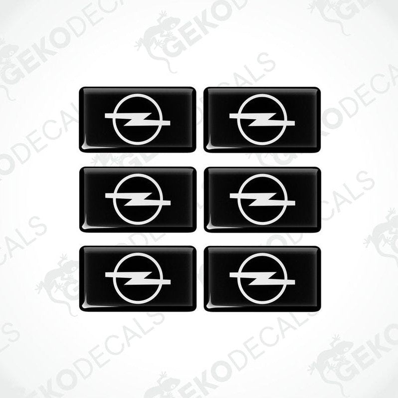 Set of six black vinyl decals with the white Opel logo.