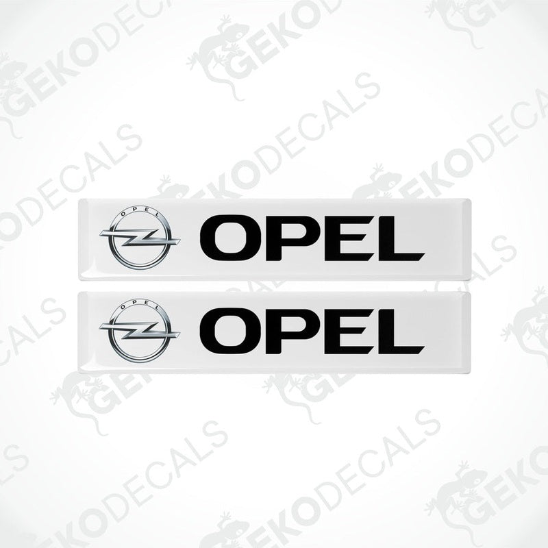 Two withe and black vinyl decals with the Opel logo