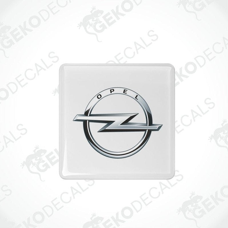 Withe domed stickers with the Opel logo in silver.