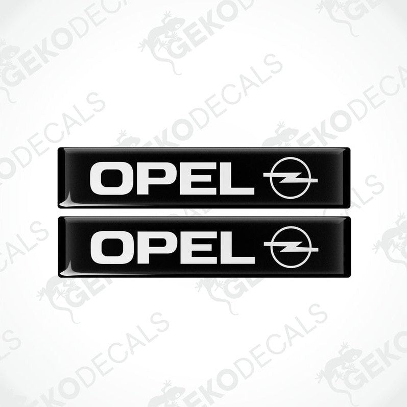 Two black and white rectangular vinyl decals with the Opel logo.