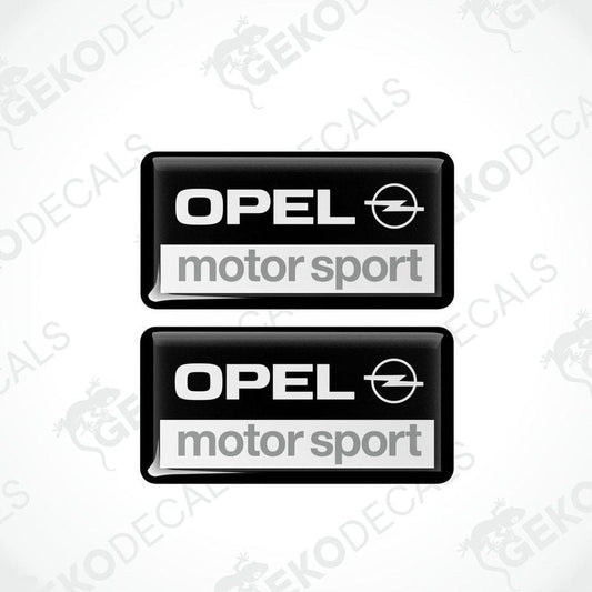 Two rectangular black vinyl decals with 'OPEL motor sport' text and the Opel logo.
