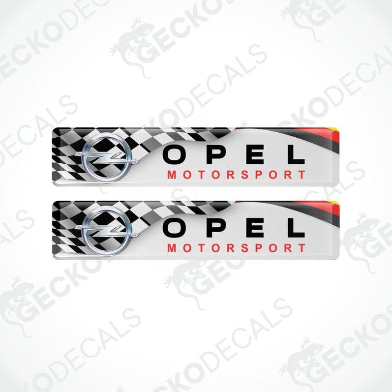 Two Opel Motorsport car decals with checkered pattern on a white background.