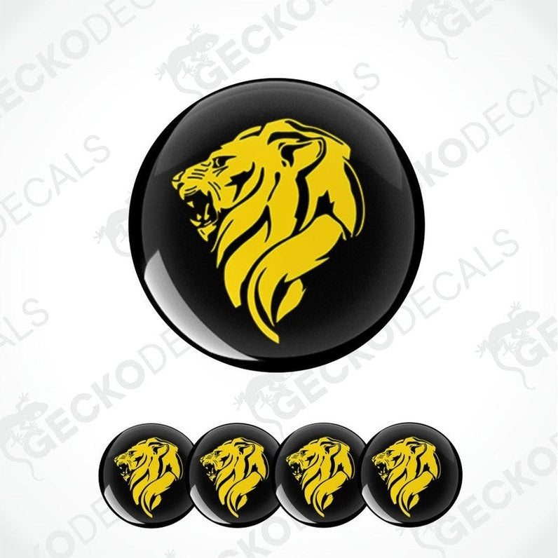 Set of black stickers with yellow lion head design on a white background.