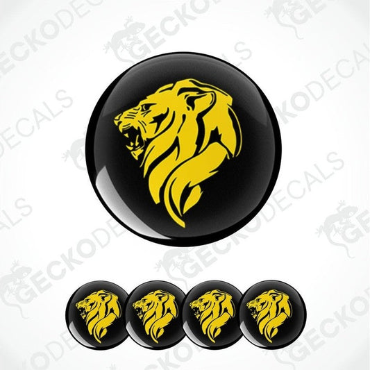 Set of black stickers with yellow lion head design on a white background.