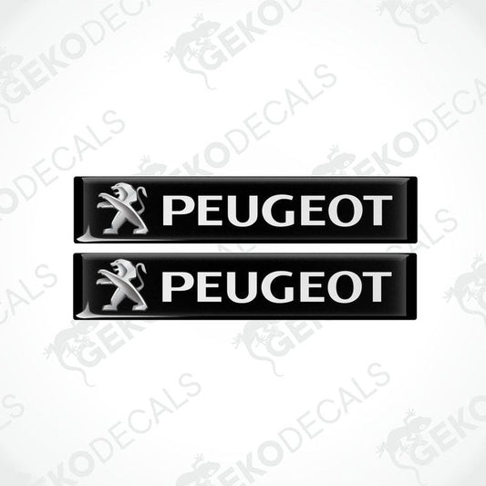 Two rectangular black vinyl decals with the PEUGEOT logo in white.