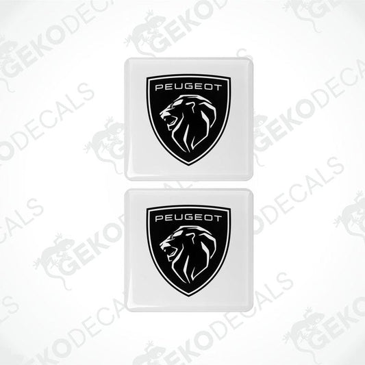 Two white vinyl stickers with a black Peugeot logo and a lion graphic.