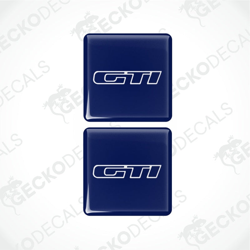 Two blue GTI logo stickers on a white background with 'GECKODECALS' branding.
