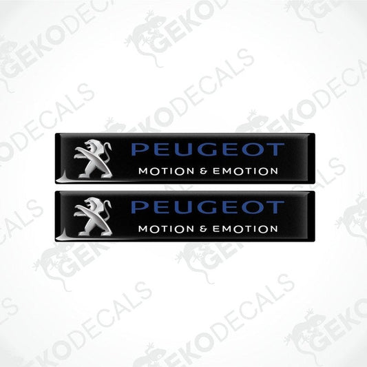 Two rectangular Peugeot car decals with the words 'Motion & Emotion' and the Peugeot logo in silver on a black background.