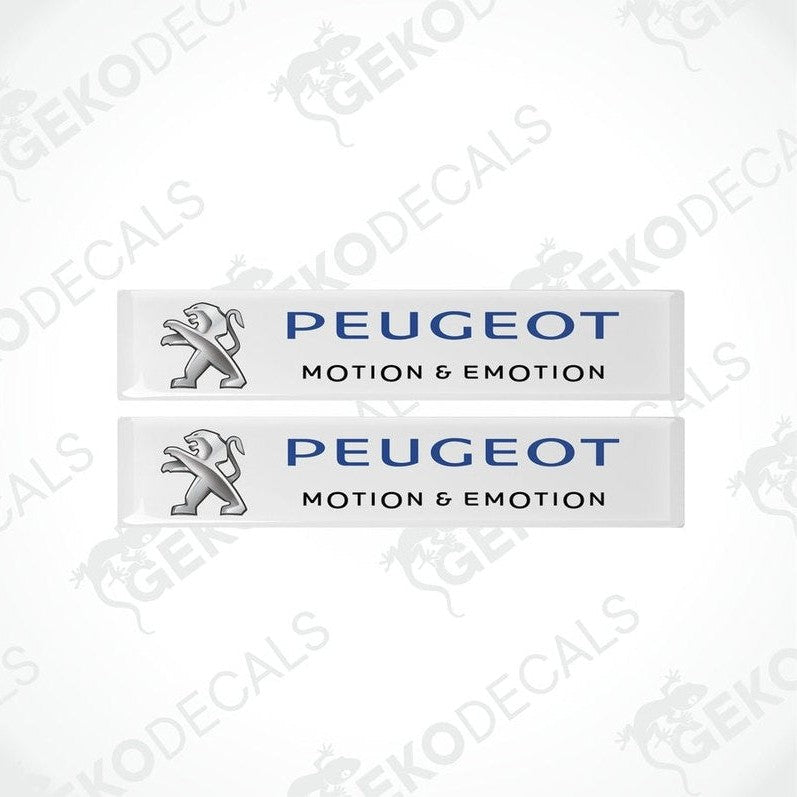 Two rectangular Peugeot car decals with the words 'Motion & Emotion' and the Peugeot logo in silver on a withe background.