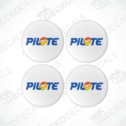 Four white vinyl decals with the Pilote brand logo in different color variations, arranged on a white background.