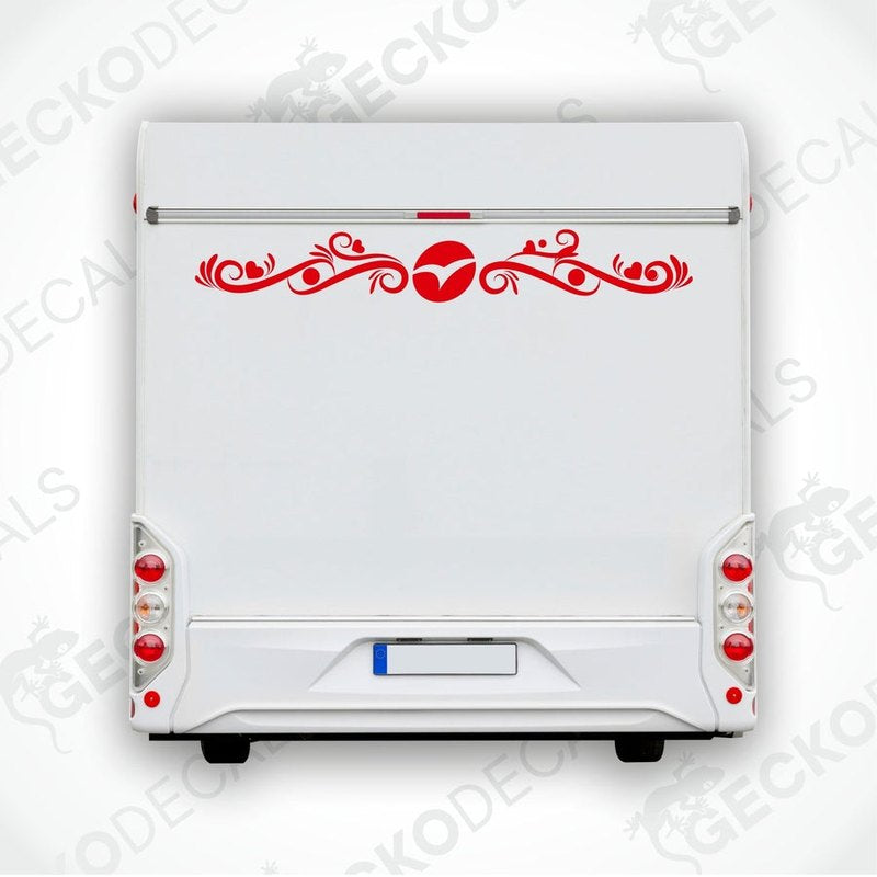 A white caravan with a red and black die cut decal on the rear side.