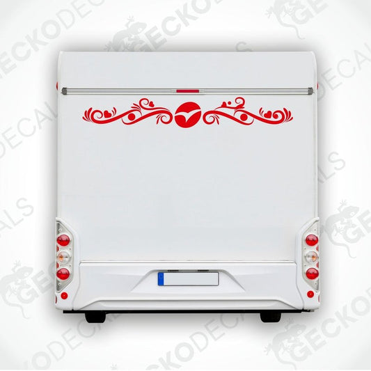A white caravan with a red and black die cut decal on the rear side.