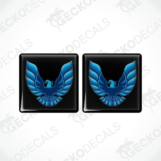 Two black vinyl stickers with a blue and white geometric design, displayed on a white background.