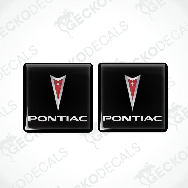 Two square-shaped vinyl decals with a polyurethane coating, featuring the PONTIAC logo in red, white, and black colors.