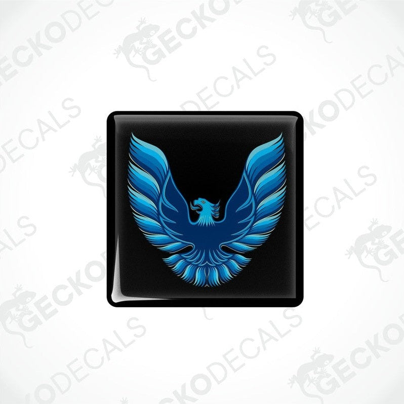 Black vinyl stickers with a blue and white geometric design, displayed on a white background.