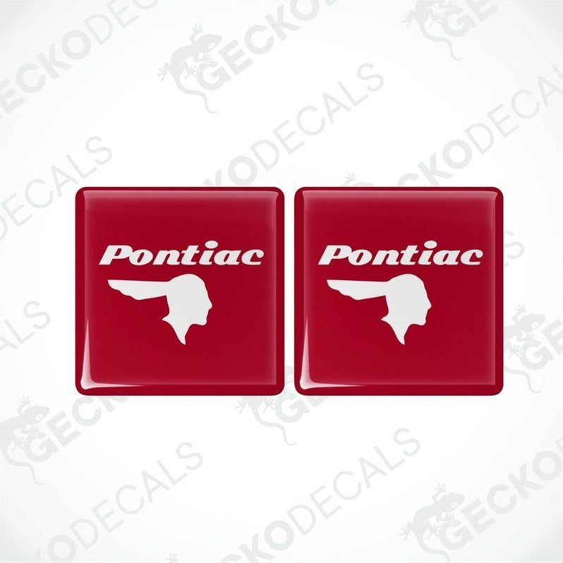 Two red vinyl stickers with a withe geometric design PONTIAC, displayed on a red background.