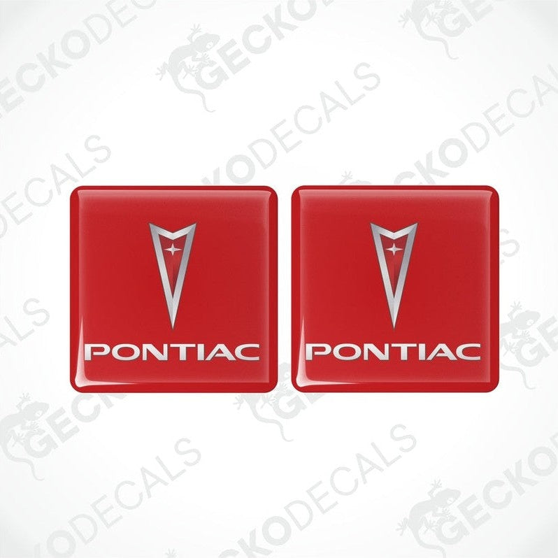 Two square-shaped vinyl decals with a polyurethane coating, featuring the PONTIAC logo in red, white, and silver colors.