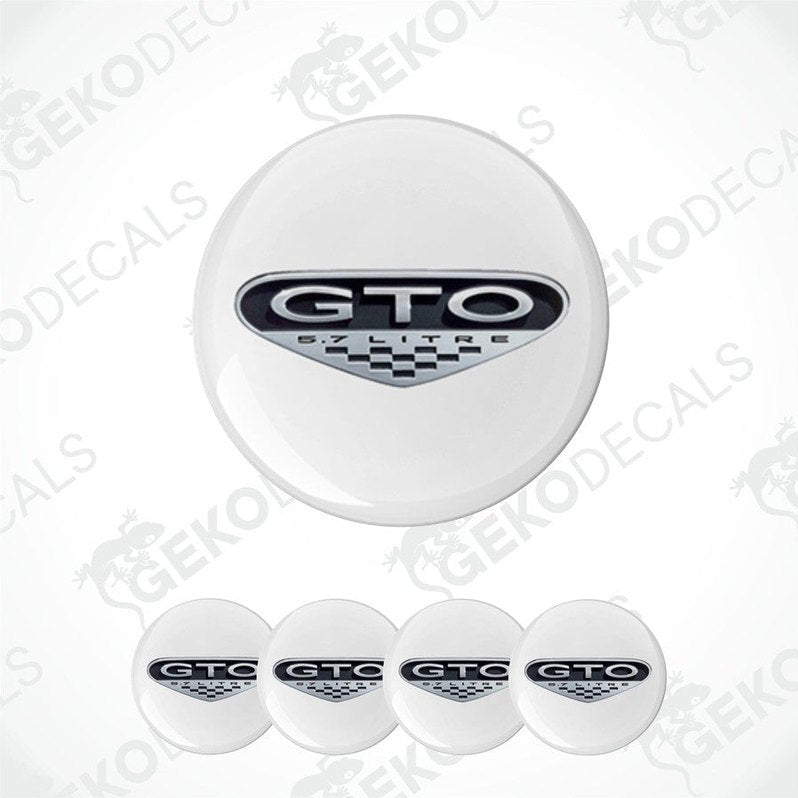 A set of four white vinyl stickers with the PONTIAC GTO logo in black.