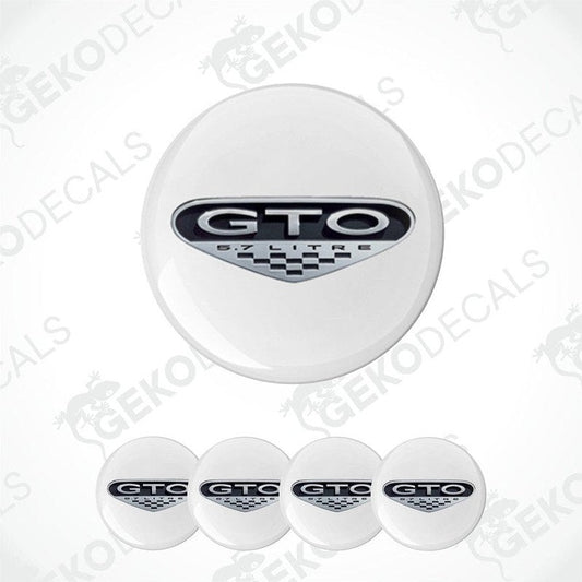 A set of four white vinyl stickers with the PONTIAC GTO logo in black.