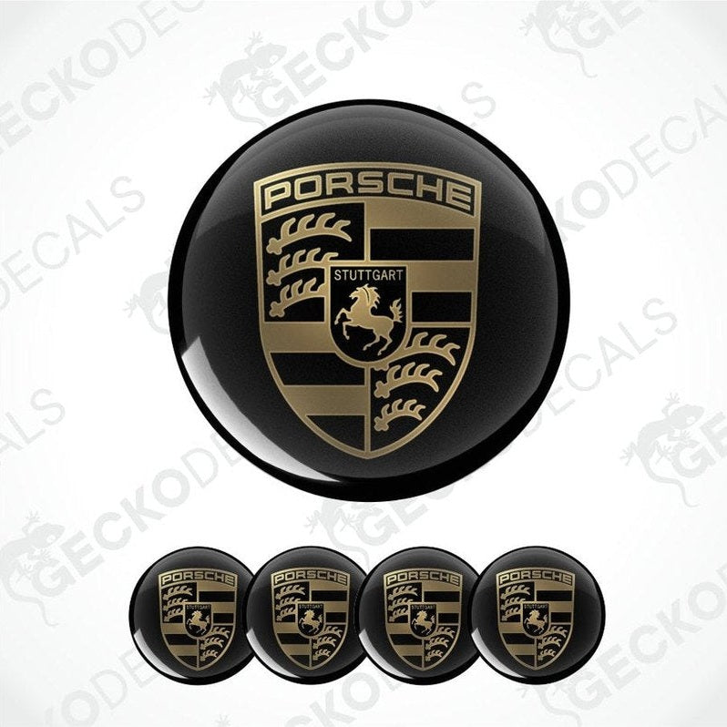 Set of Porsche logos on black round stickers with a white background.
