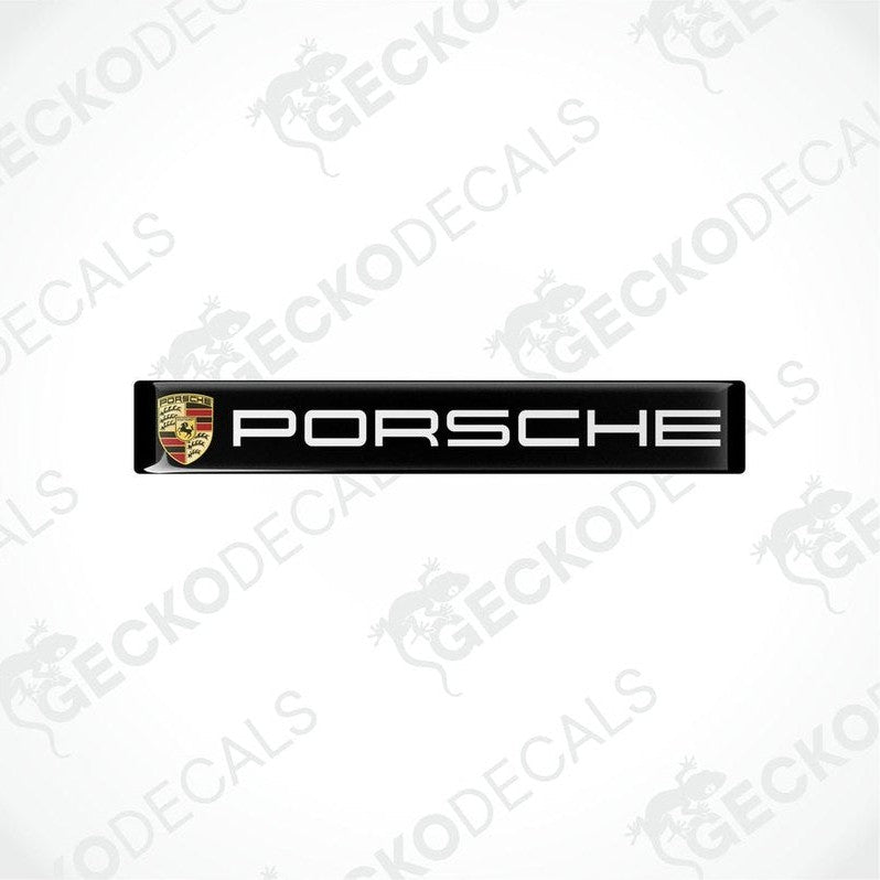  Black vinyl stickers with the Porsche brand logo on each.