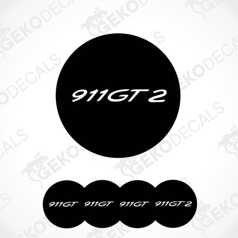 A set of four black vinyl stickers with the text '911 GT2' embossed on them, displayed against a white background.