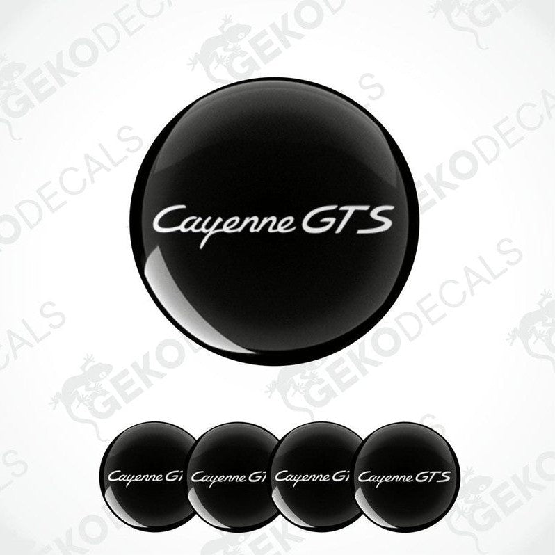A set of four black vinyl stickers with the text 'CAYENNE GTS' on a white background, with a logo depicting a black car.