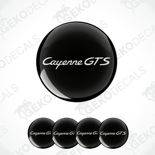 A set of four black vinyl stickers with the text 'CAYENNE GTS' on a white background, with a logo depicting a black car.
