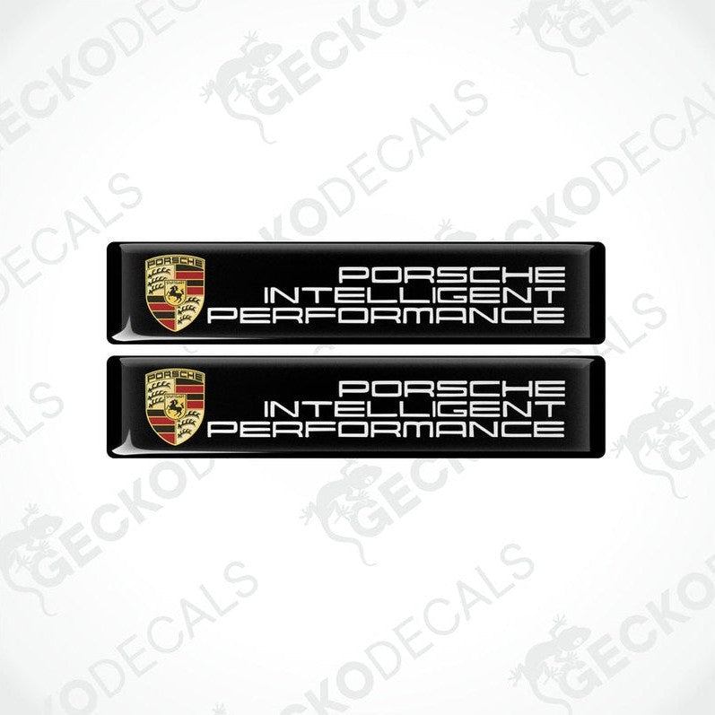 Two black vinyl stickers with the PORSCHE logo.