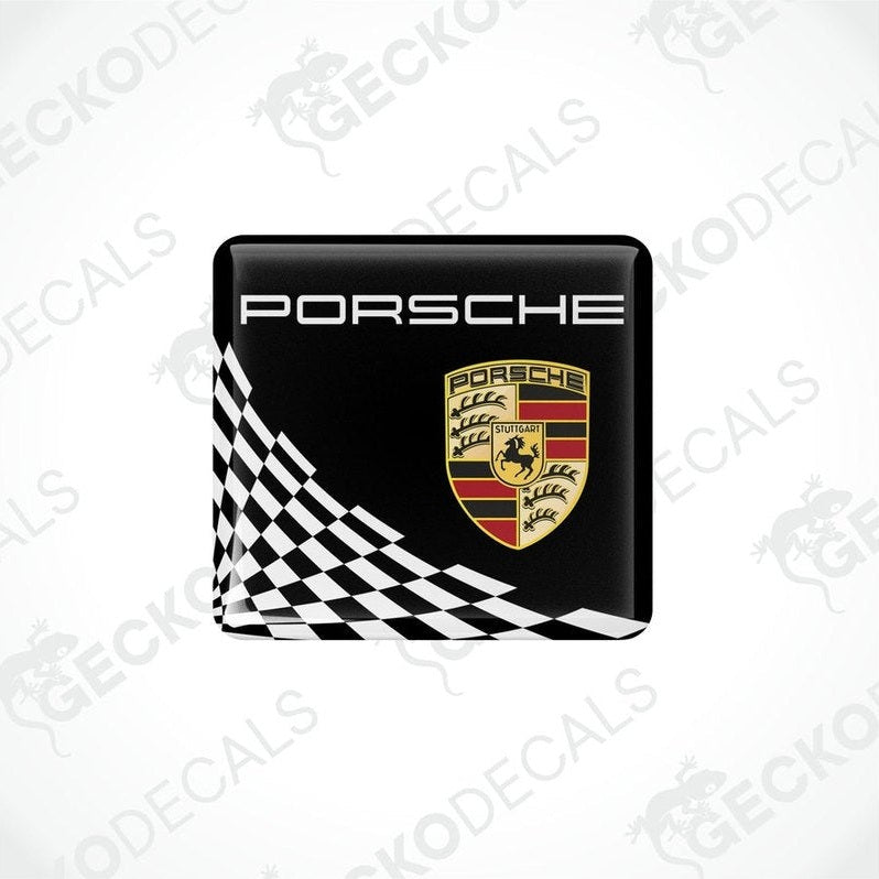  Black, white, and gold Porsche branded vinyl stickers with a checkered pattern.