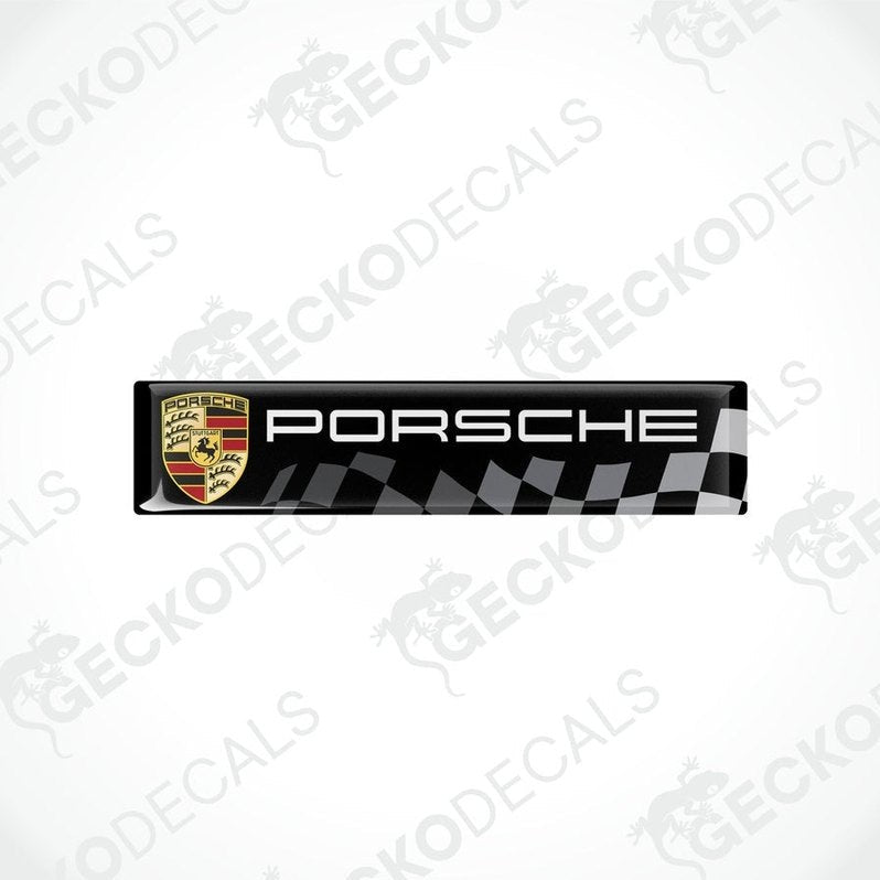 Black, silver, and red checkered vinyl decals with the Porsche logo