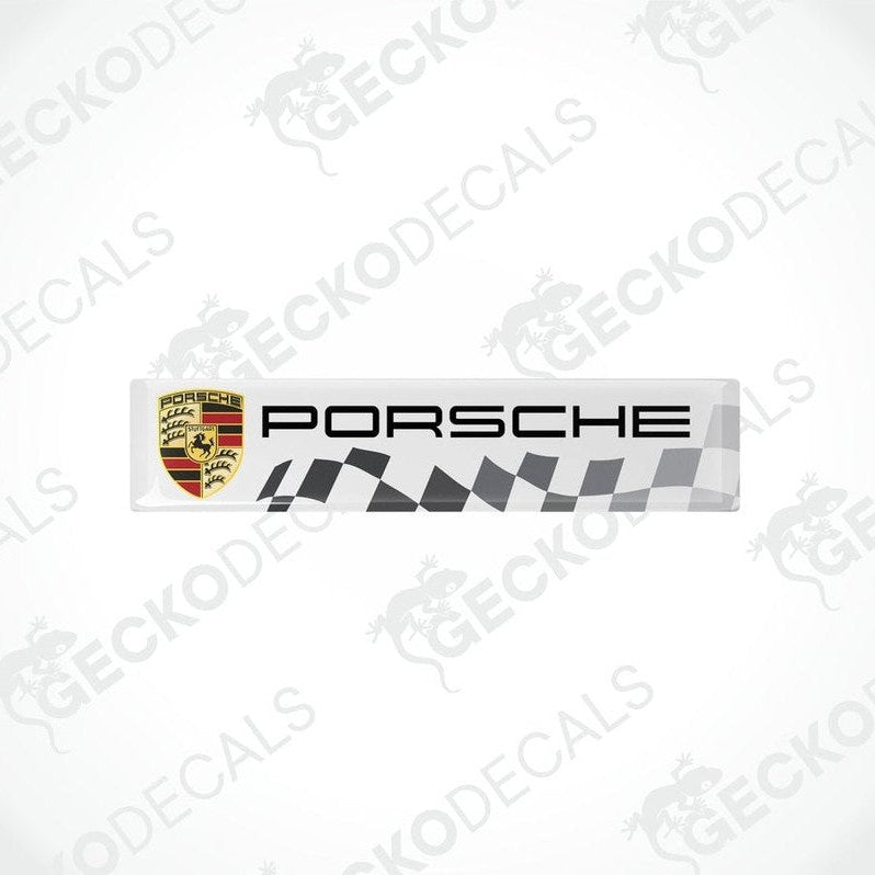 Withe, silver, and red checkered vinyl decals with the Porsche logo