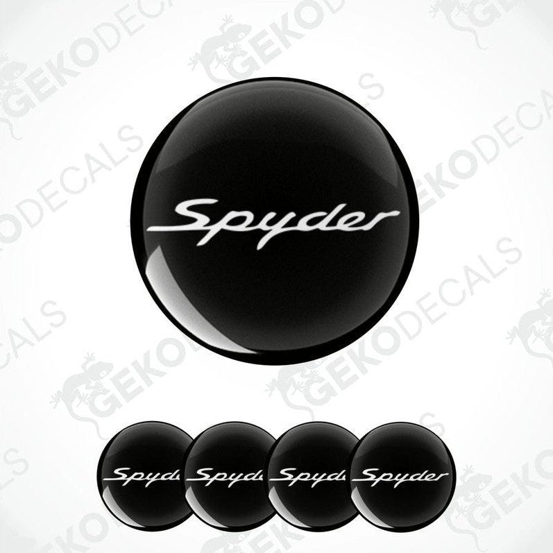 A set of four black vinyl stickers with the word 'Spyder' branded on them, designed for use as car decals.