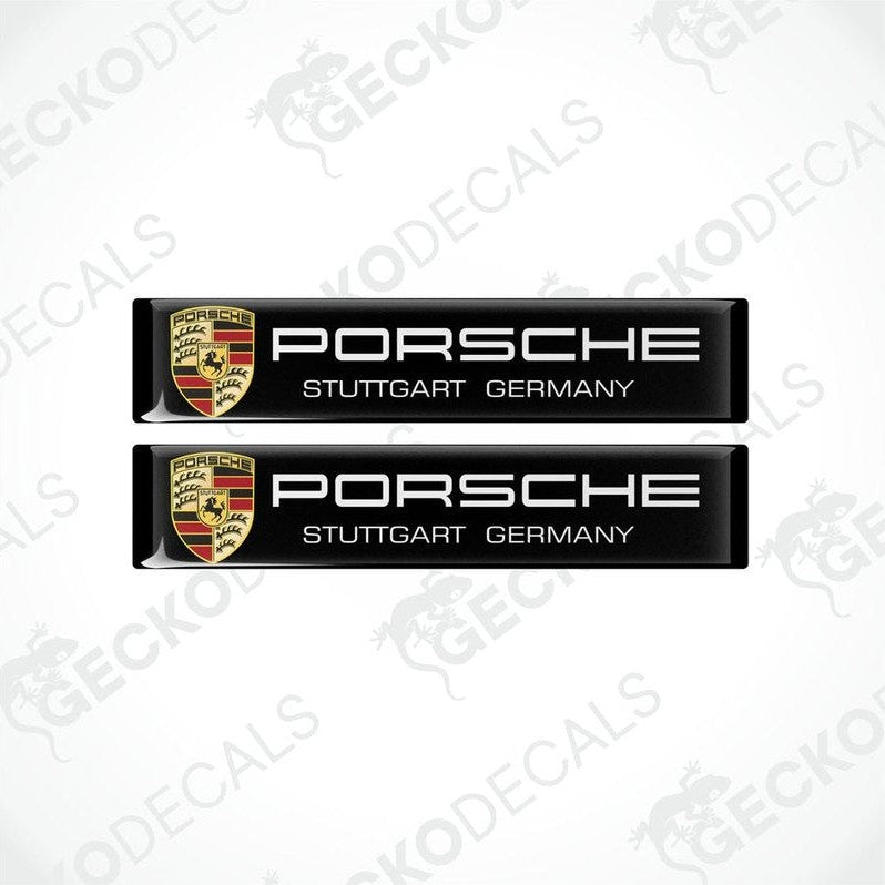 Two black vinyl stickers with the Porsche brand logo and the text 'Stuttgart Germany'.