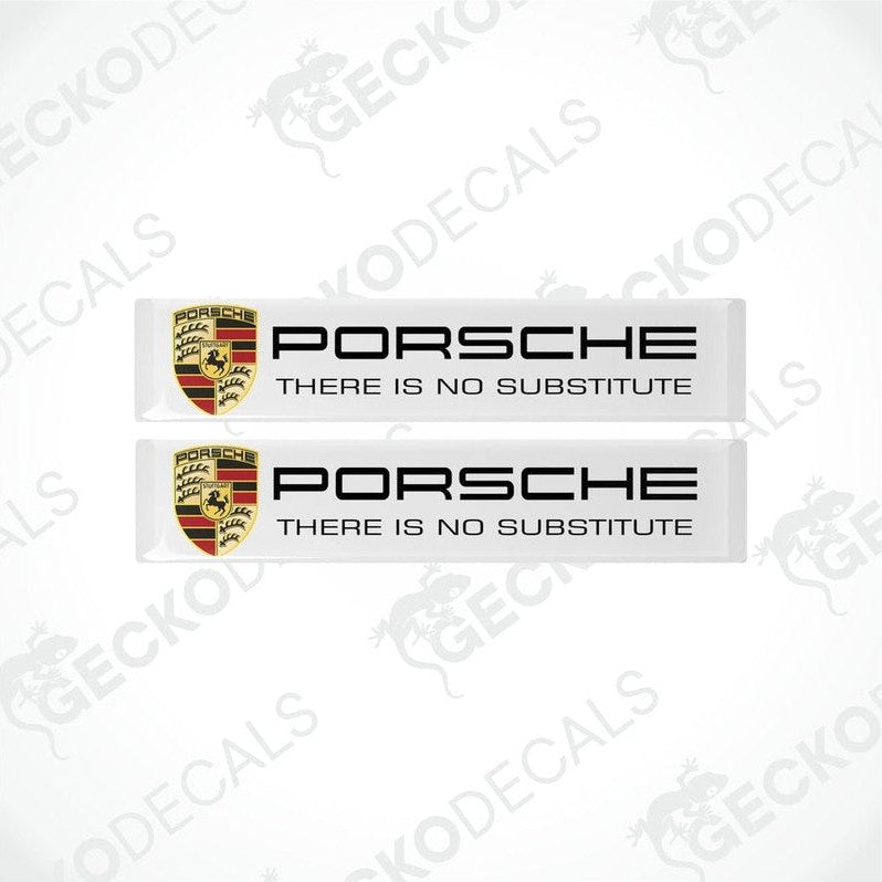 Two withe vinyl decals with the Porsche logo and the text 'there is no substitute' on them.