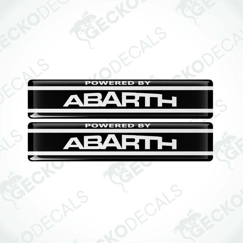 Two black vinyl stickers with the text 'POWERED BY ABARTH' and a logo depicting a stylized 'A' in white on a black background, placed against a white background with 'GECKODECALS' and 'ABARTH' logos.