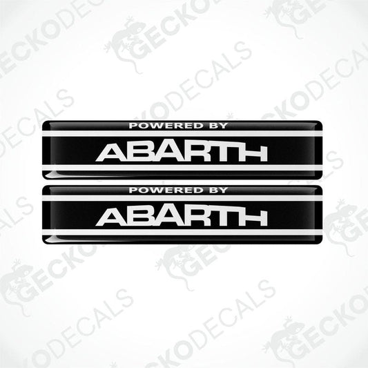 Two black vinyl stickers with the text 'POWERED BY ABARTH' and a logo depicting a stylized 'A' in white on a black background, placed against a white background with 'GECKODECALS' and 'ABARTH' logos.
