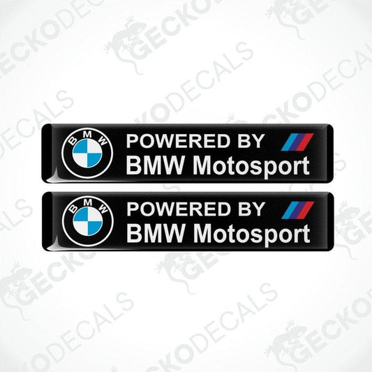 Two rectangular black vinyl decals with the 'POWERED BY BMW Motosport' logo in white and red.