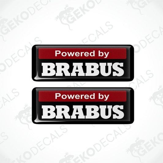 Two black and red vinyl decals with white text that read 'POWERED BY BRABUS.