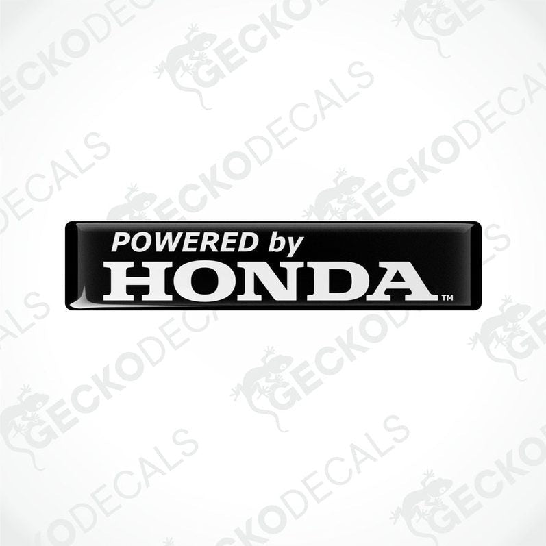  Black vinyl decals with white text 'POWERED by HONDA' on a textured background.