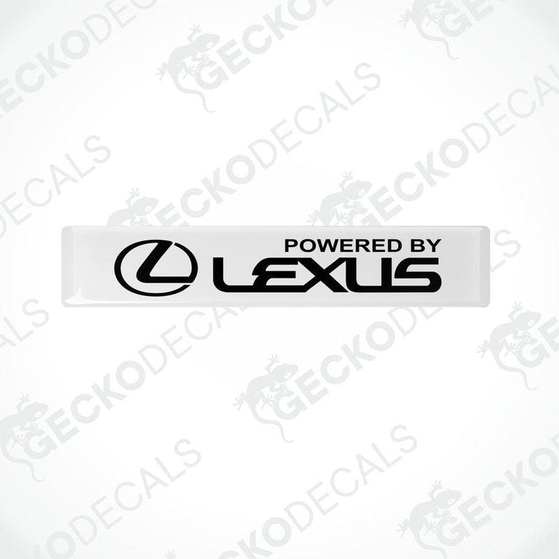 White rectangular car decals with the black text 'POWERED BY LEXUS' on the front.