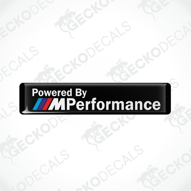 Black vinyl stickers with the text 'POWERED BY M PERFORMANCE' and the BMW logo.