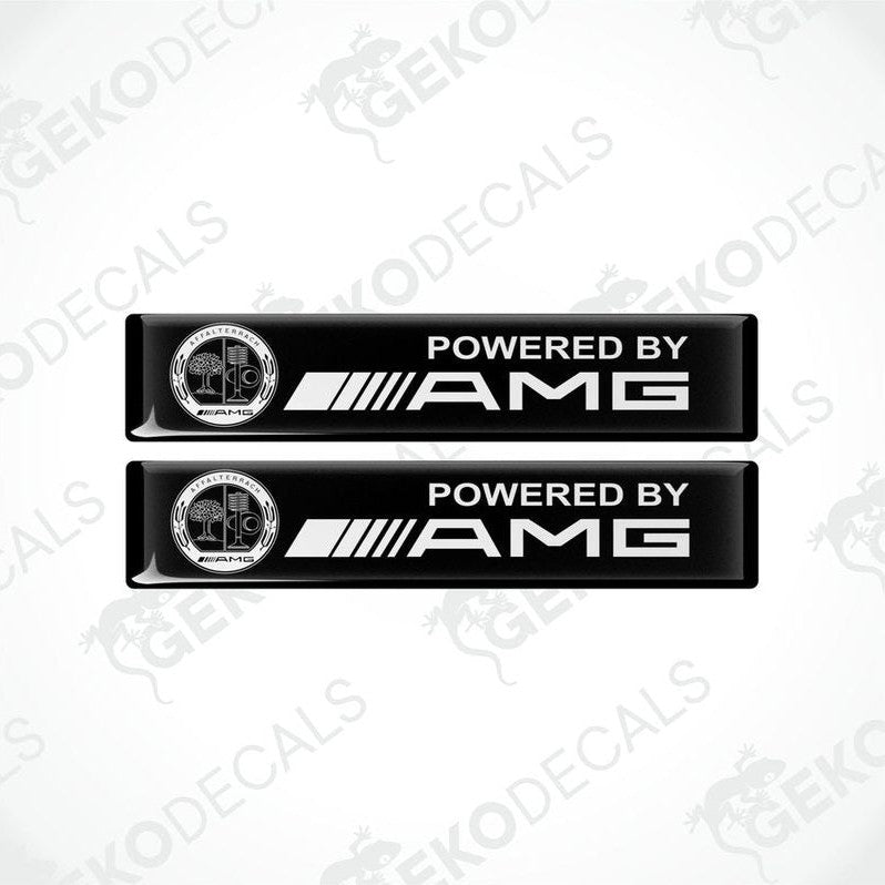 Two black vinyl decals with the text 'POWERED BY AMG' and the AMG logo.