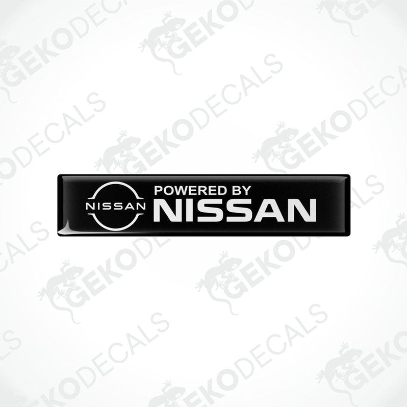 Black vinyl stickers with 'Powered by NISSAN' text and a white circular logo of NISSAN in the center.