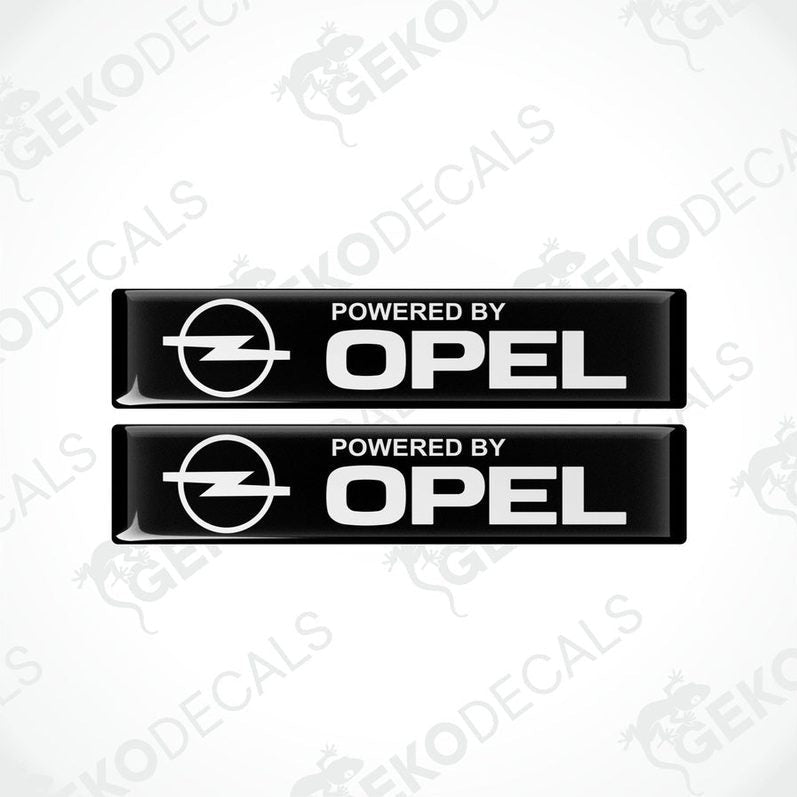 Two black vinyl stickers with the text 'POWERED BY OPEL' and the Opel logo.
