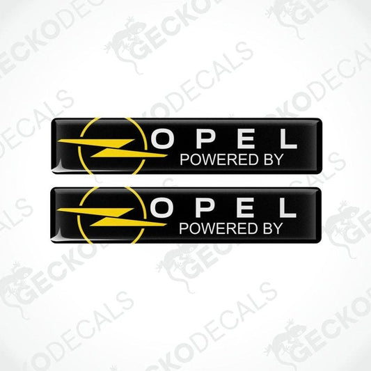 Two Opel logo stickers with 'Powered by' text on a white background.