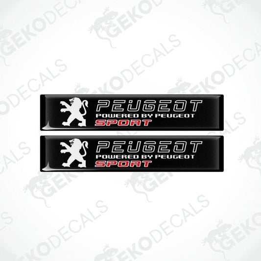 Two black vinyl stickers with the text 'PEUGEOT POWERED BY PEUGEOT SPORT' and a graphic of a lion.