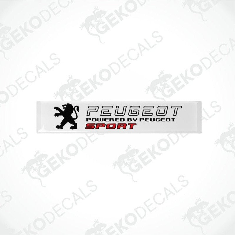Withe vinyl stickers with the text 'PEUGEOT POWERED BY PEUGEOT SPORT' and a graphic of a lion.